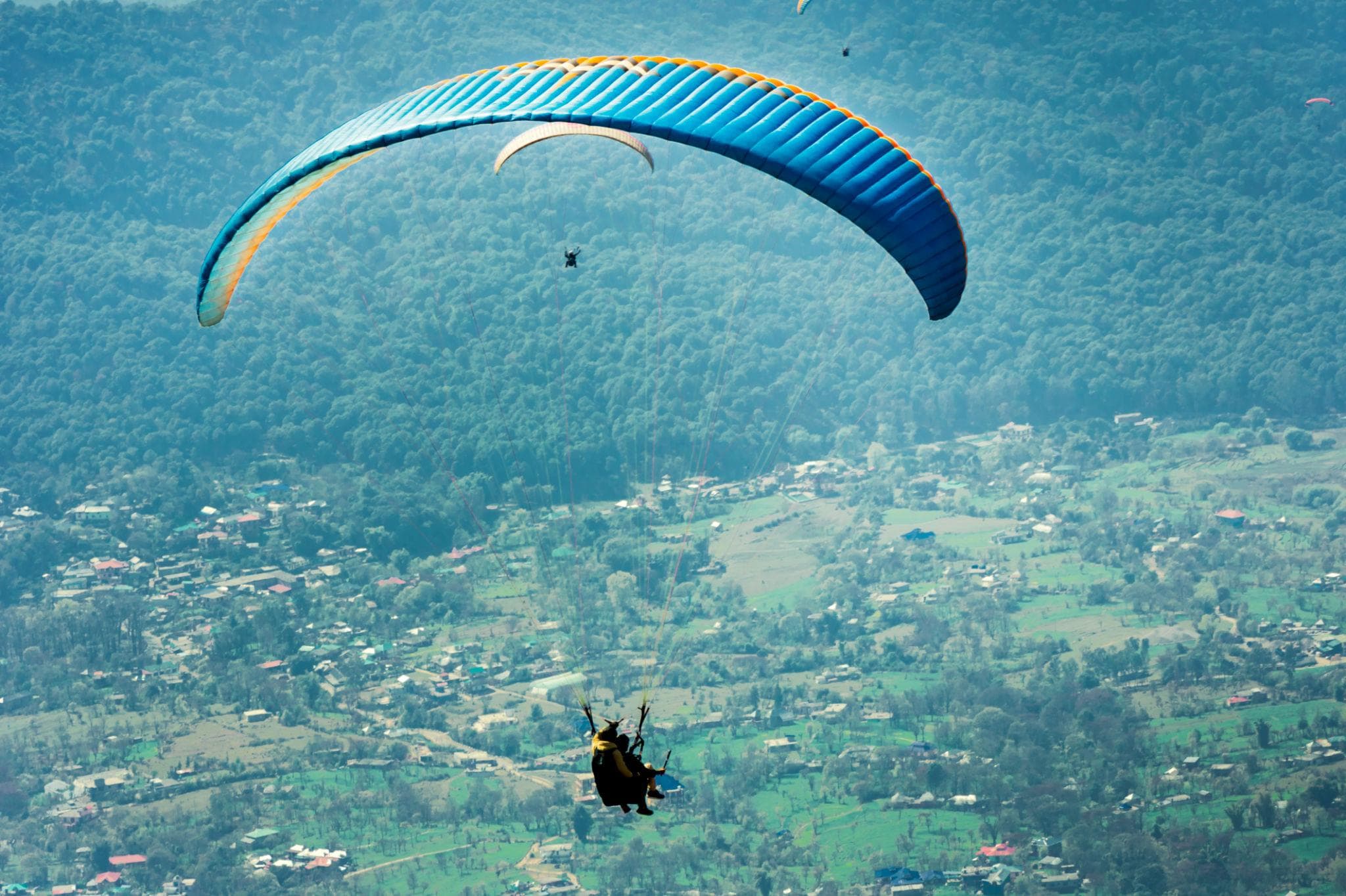 A paraglider above the Kangra valley